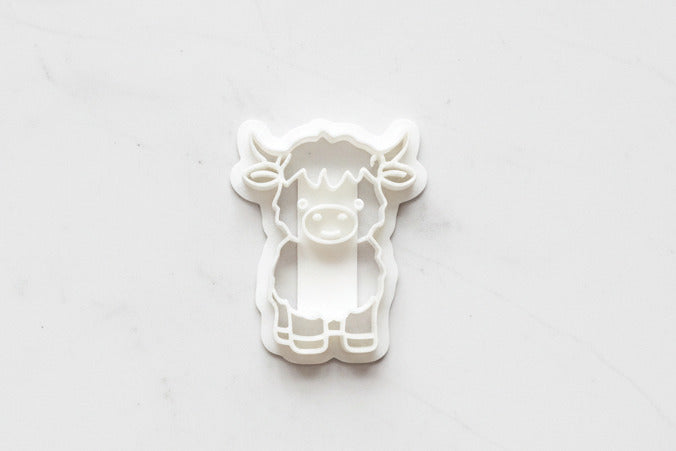 Cute standing highland cow