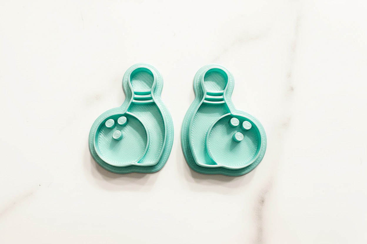 Bowling pin and ball mirrored set