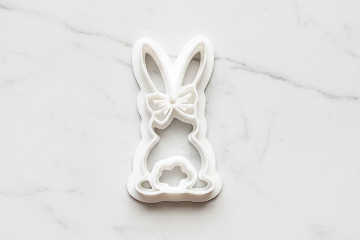 Back of girl bunny with bow