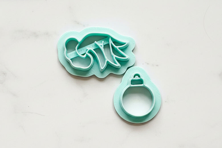 Grinch hand and ornament