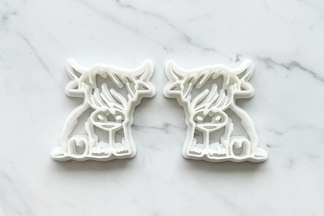 Highland cow sitting mirrored set