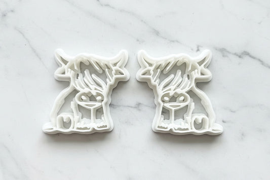 Highland cow sitting mirrored set