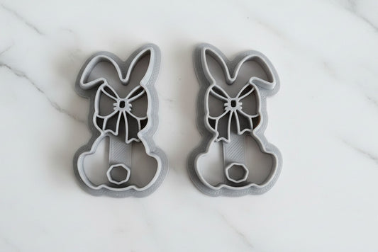 girl flopped ear back of bunny