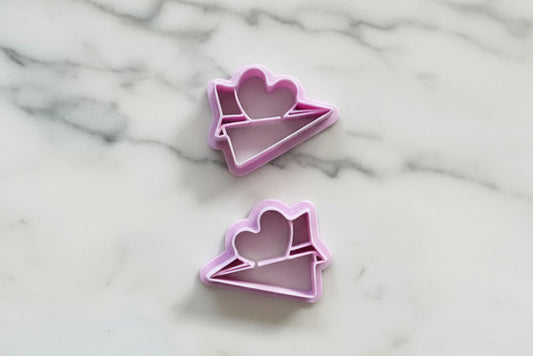 paper air plane with heart