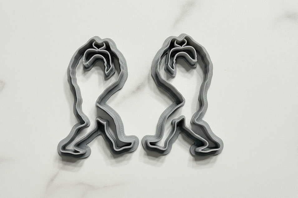 Mirrored Bigfoot holding a heart
