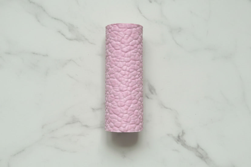 Hammered metal roller