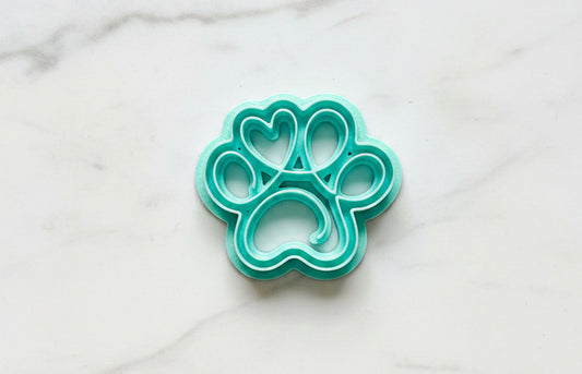 Lined paw print with heart
