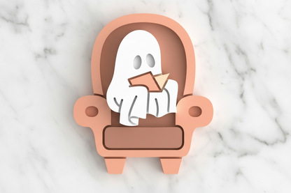 Ghost sitting on a chair reading